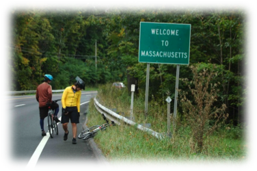 photo of two bicyclists on roadway