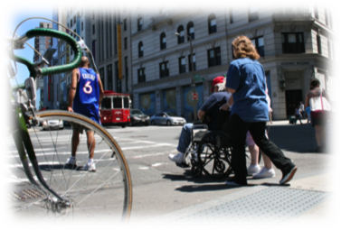 photo of pedestrians traversing a crosswalk